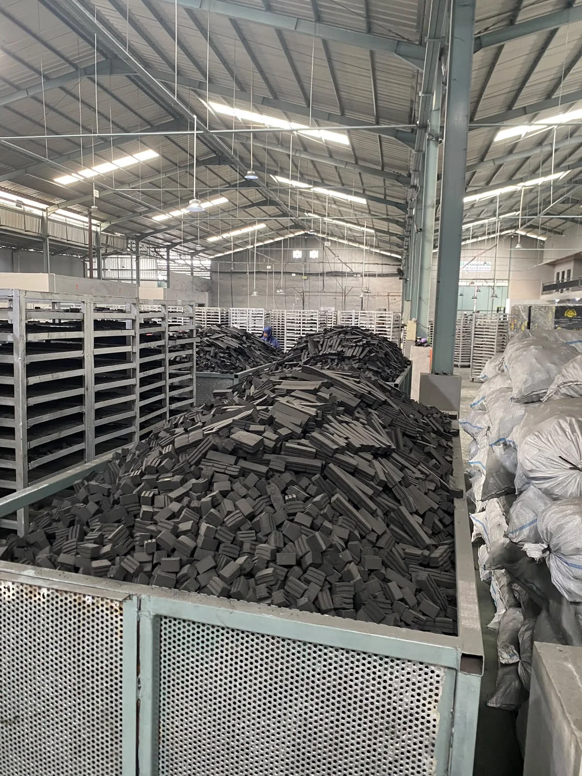 Stored briquettes inside factory
